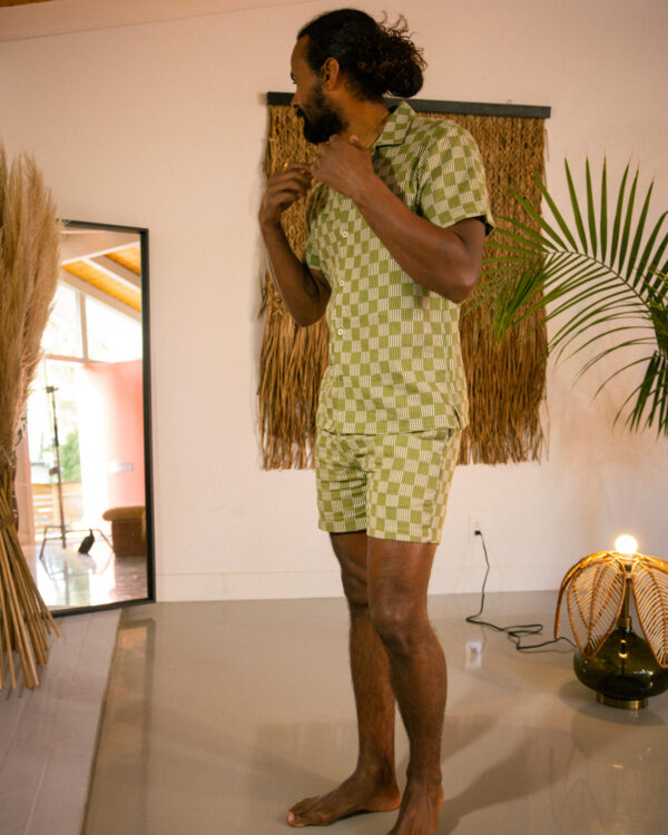 man in matching green cabana set